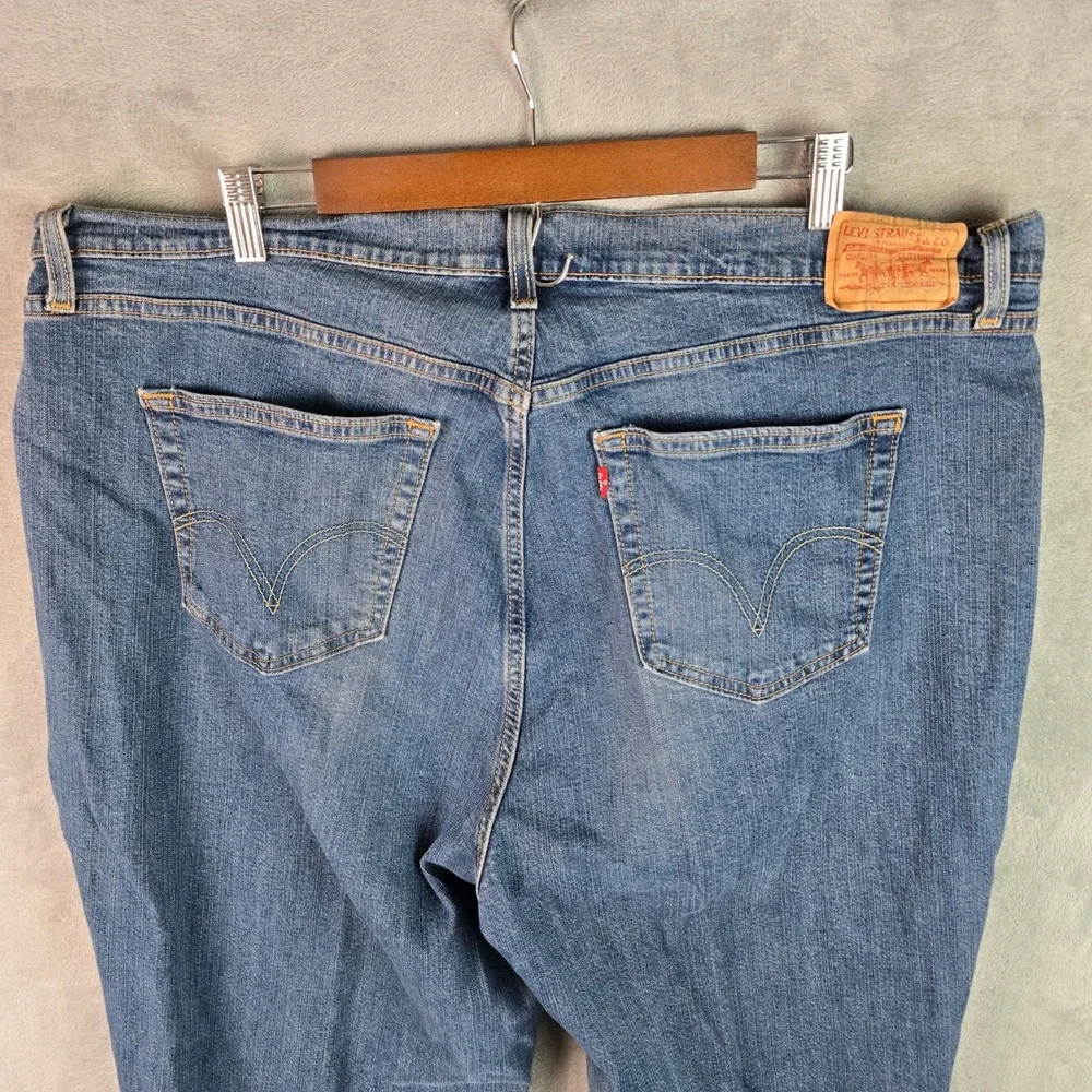 Levis 550 Relaxed Boot Cut Jeans Mens 42x31 Medium Wash Blue Denim 095553107